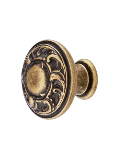 Scroll Design Cabinet Knob in Antique Brass Dark.